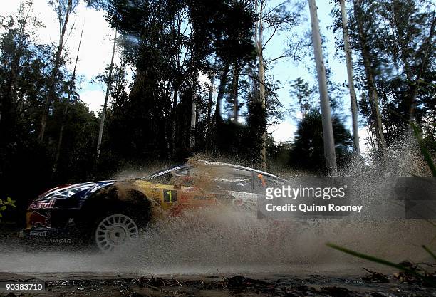 Sebastien Loeb of France and Daniel Elena of Monaco compete in their Citroen C4 Total during the Repco Rally of Australia Special Stage 32 on...