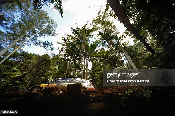 Sebastien Loeb of France and Daniel Elena of Monaco compete in their Citroen C 4 Total during day three of theWRC Repco Rally of Australia on...