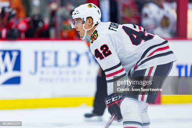 Chicago Blackhawks Defenceman Gustav Forsling prepares for a face-off during first period National Hockey League action between the Chicago...