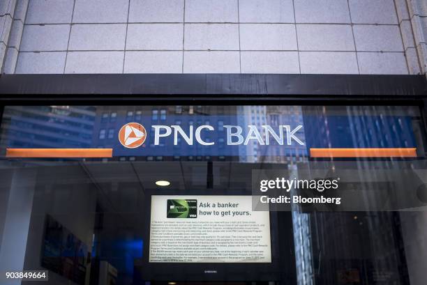 Signage is displayed at a PNC Financial Services Group Inc. Bank branch in downtown Chicago, Illinois, U.S., on Monday, Jan. 8, 2018. PNC Financial...