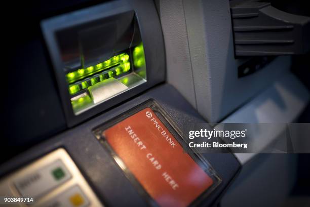 Financial Services Group Inc. Signage is seen on an automatic teller machine in downtown Chicago, Illinois, U.S., on Tuesday, Jan. 9, 2018. PNC...