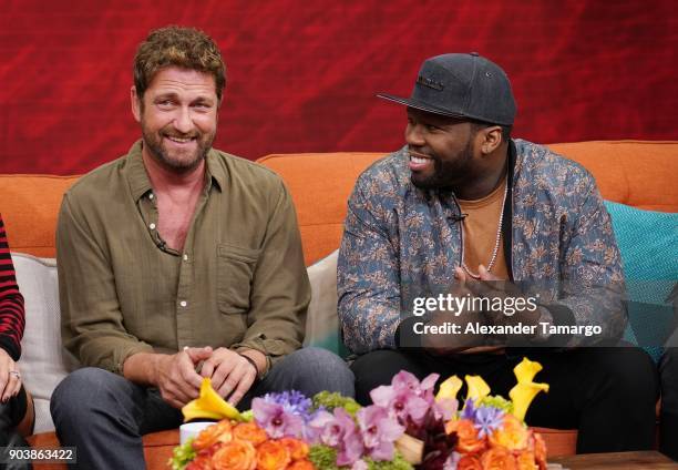 Gerard Butler and Curtis "50 Cent" Jackson are seen on the set of "Despierta America" at Univision Studios to promote the film "Den of Thieves" on...