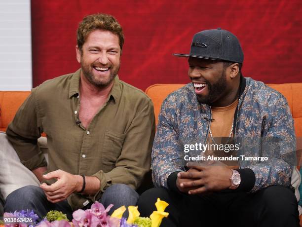 Gerard Butler and Curtis "50 Cent" Jackson are seen on the set of "Despierta America" at Univision Studios to promote the film "Den of Thieves" on...