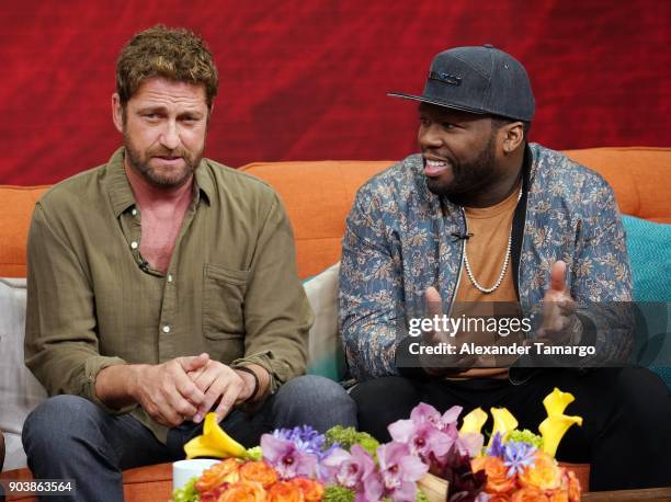 Gerard Butler and Curtis "50 Cent" Jackson are seen on the set of "Despierta America" at Univision Studios to promote the film "Den of Thieves" on...