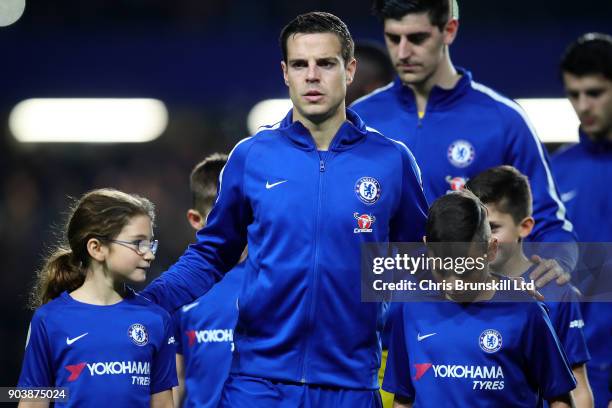 Cesar Azpilicueta of Chelsea leads his team out ahead of the Carabao Cup Semi-Final first leg match between Chelsea and Arsenal at Stamford Bridge on...