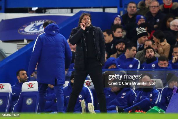 Chelsea manager Antonio Conte shouts from the touchline during the Carabao Cup Semi-Final first leg match between Chelsea and Arsenal at Stamford...