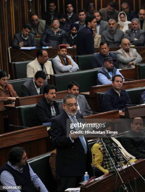 Jammu, India Jammu and Kashmir Finance Minister Haseeb Drabu presents Budget 2018-2019 in J&K Legislative Assembly during the budget session, in...