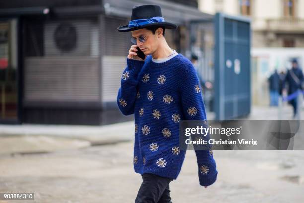 Alessandro Enriquez wearing blue hat, knit is seen during the 93. Pitti Immagine Uomo at Fortezza Da Basso on January 11, 2018 in Florence, Italy.