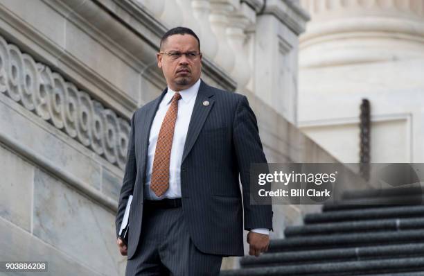 Rep. Keith Ellison, D-Minn., walks down the House steps after the final votes of the week on Thursday, Jan. 11, 2018.