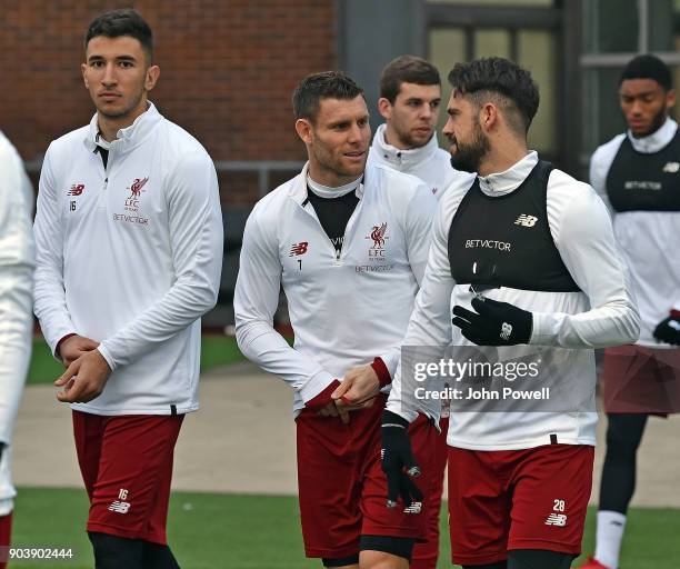 Marko Grujic, James Milner and Danny Ings of Liverpool during a training session at Melwood Training Ground on January 11, 2018 in Liverpool, England.