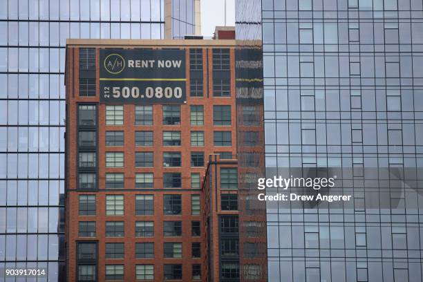 An apartment building advertising 'For Rent' stands in the Chelsea neighborhood in Manhattan, January 11, 2018 in New York City. According to a real...