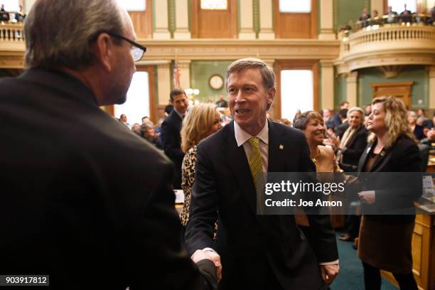 January 11: State Representative Steve Lebsock shaking the hand of Governor John Hickenlooper after delivering the Colorado State of the State...