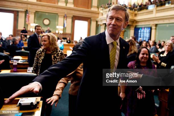 January 11: Governor John Hickenlooper shaking hands after delivering his final the Colorado State of the State address at the Colorado State...