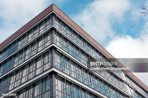 glass facade of office building - eliachevitch stock pictures, royalty-free photos & images