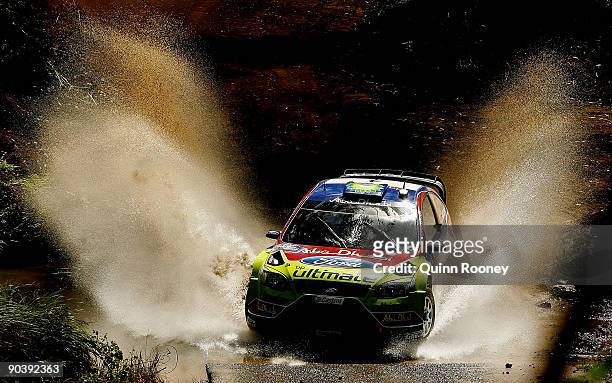 Jari Matti Latvala of Finland and Mikka Anttila of Finland compete in their BP Abu Dhabi Ford Focus during the Repco Rally of Australia Special Stage...