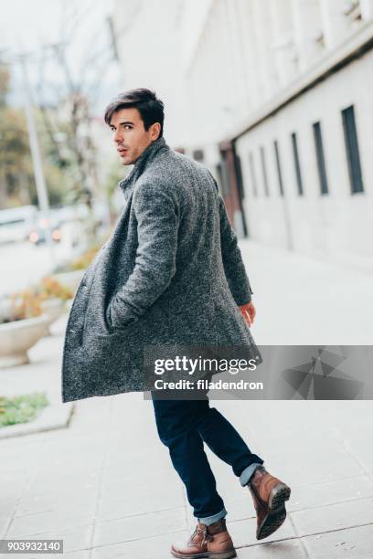 elegant man in the city - male model turned stock pictures, royalty-free photos & images
