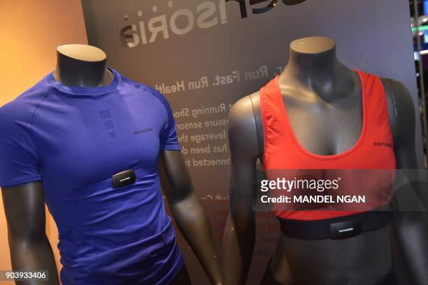 Sensoria t-shirt and sports bra with heart rate monitor are seen during CES 2018 in Las Vegas on January 11, 2018. Large crowds pack the 2018...