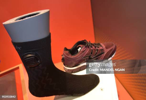 The Sensoria smart sock and running are seen during CES 2018 in Las Vegas on January 11, 2018. Large crowds pack the 2018 Consumer Electronics Show,...