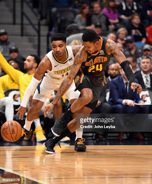 Denver Nuggets guard Gary Harris steals the ball away from Atlanta Hawks guard Kent Bazemore during the first quarter on January 10, 2018 at Pepsi...