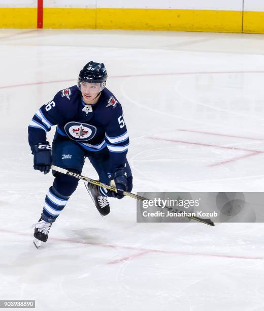 Marko Dano of the Winnipeg Jets follows the play down the ice during second period action against the San Jose Sharks at the Bell MTS Place on...