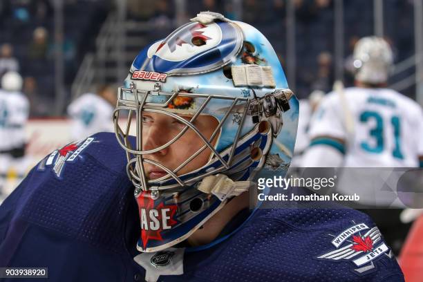 Goaltender Steve Mason of the Winnipeg Jets looks on during the pre-game warm up prior to NHL action against the San Jose Sharks at the Bell MTS...