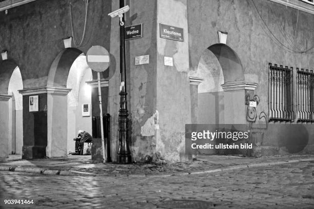 Bettler in der Altstadt von Poznan - Polen