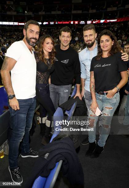 Robert Pires, Natacha Tannous, Michael Ballack, Olivier Giroud and Jessica Lemarie-Pires attend the Philadelphia 76ers and Boston Celtics London game...