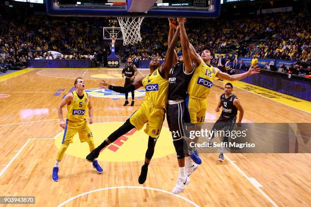 Augustine Rubit, #21 of Brose Bamberg competes with Deshaun Thomas, #1 of Maccabi Fox Tel Aviv during the 2017/2018 Turkish Airlines EuroLeague...