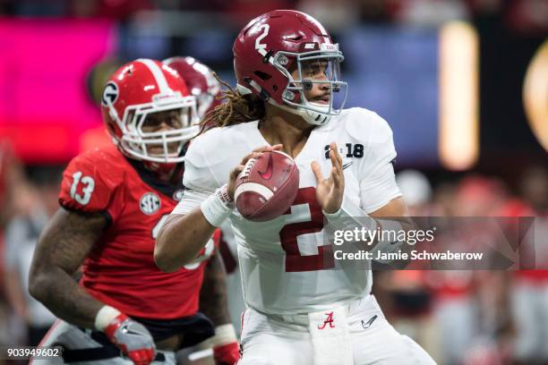 Jalen Hurts of the Alabama Crimson Tide passes against the Georgia Bulldogs during the College Football Playoff National Championship held at...