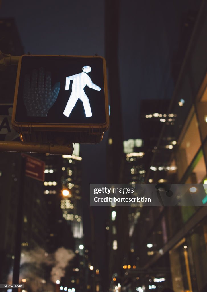 Close-Up Of Road Signal At Night