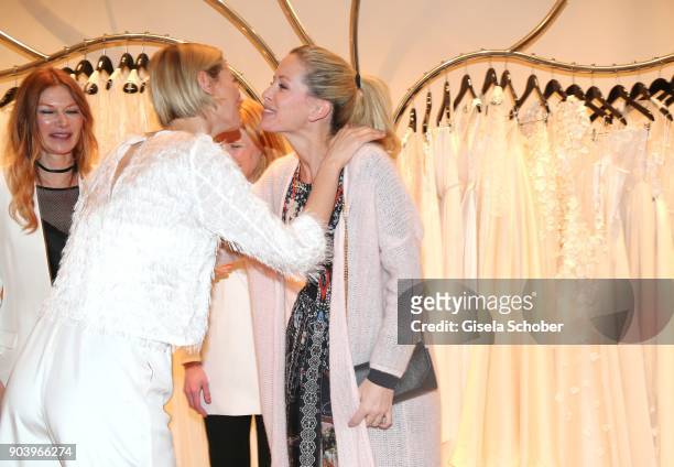 Model Sarah Brandner and Carina Gomez, wife of Mario Gomez, pregnant, during the opening of the Kaviar Gauche Bridal Concept Store on January 11,...