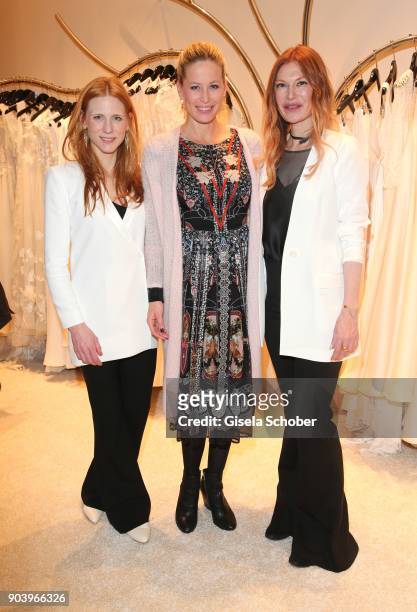 Fashion designer Johanna Kuehl and model Carina Gomez, wife of Mario Gomez, pregnant, and Fashion designer Alexandra Fischer-Roehler during the...