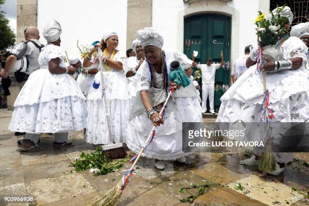 Hundreds of believers participate in the traditional pre-carnival event "Lavagem das Escadarias Bonfim" - a symbolic washing of the stairs of the...