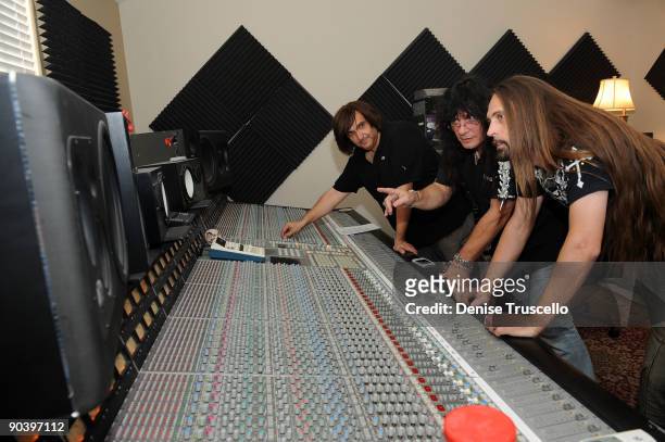 Tom Parham, singer Paul Shortino and guitarist Ira Black are seen during the music recording of the "Send in the Clowns" video recording on September...