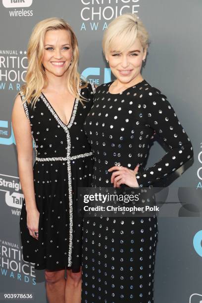 Actors Reese Witherspoon and Emilia Clarke attend The 23rd Annual Critics' Choice Awards at Barker Hangar on January 11, 2018 in Santa Monica,...