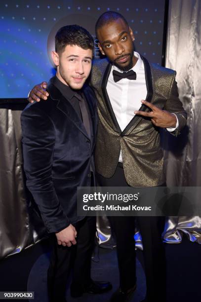 Actors Nick Jonas and Jay Pharoah attend Moet & Chandon celebrate The 23rd Annual Critics' Choice Awards at Barker Hangar on January 11, 2018 in...