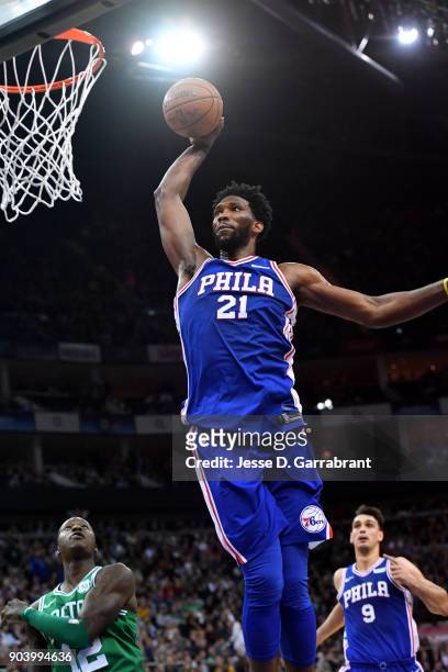 Joel Embiid of the Philadelphia 76ers dunks the ball during the game against the Boston Celtics on January 11, 2018 at The O2 Arena in London,...