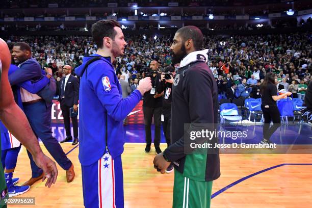 Redick of the Philadelphia 76ers exchanges handshakes with Kyrie Irving of the Boston Celtics after the game between the two teams on January 11,...
