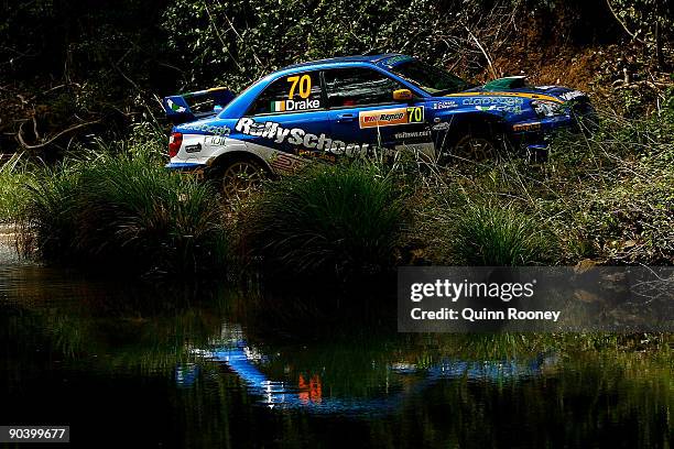 Charlie Drake of Ireland and Eoin Moynihan of Ireland compete in their Subaru Impreza WRX during the Repco Rally of Australia Special Stage 32 on...