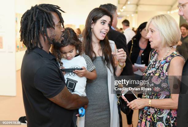 Edwin Baker and Olivia Namath attend the Palm Beach Modern + Contemporary VIP Opening Preview Presented By Art Miami on January 11, 2018 in West Palm...