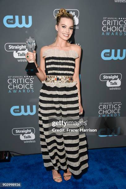 Actor Margot Robbie, winner of ' Best Actress In A Comedy' for 'I, Tonya', poses in the press room during The 23rd Annual Critics' Choice Awards at...