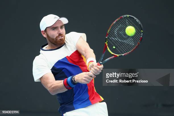 Bjorn Fratangelo of United States competes in his second round match against Zsombor Piros of Hungary during 2018 Australian Open Qualifying at...