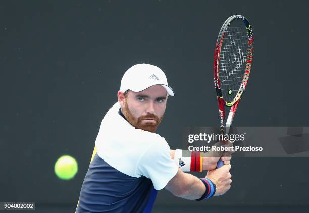 Bjorn Fratangelo of United States competes in his second round match against Zsombor Piros of Hungary during 2018 Australian Open Qualifying at...