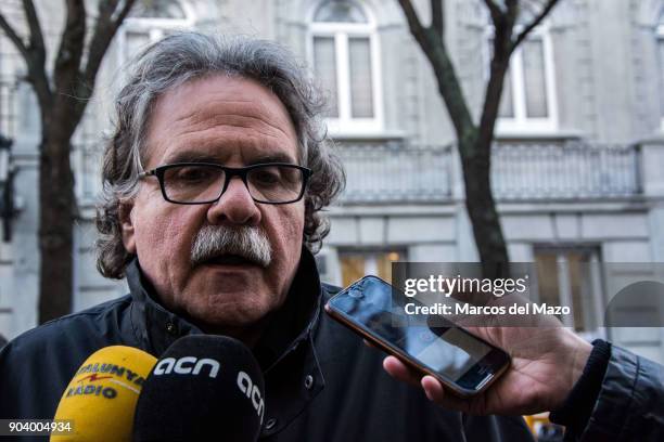 Joan Tarda from Esquerra Republicana de Catalunya speaks to the press as pro-independence Catalan leaders Jordi Sanchez and Jordi Cuixart known as...