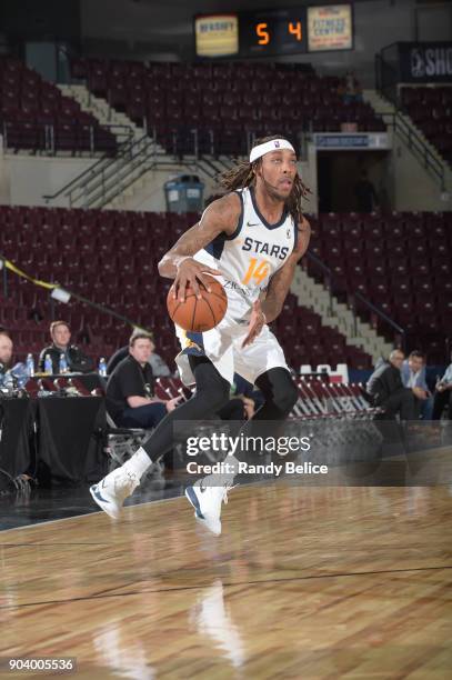 Michael Qualls of the Salt Lake City Stars handles the ball during the game against the Delaware 87ers at the NBA G League Showcase Game 12 on...