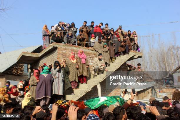 Thousands of people participate in the funeral service of slain Hizb militant Farhan Wani at his ancestral villages in Kulgam.