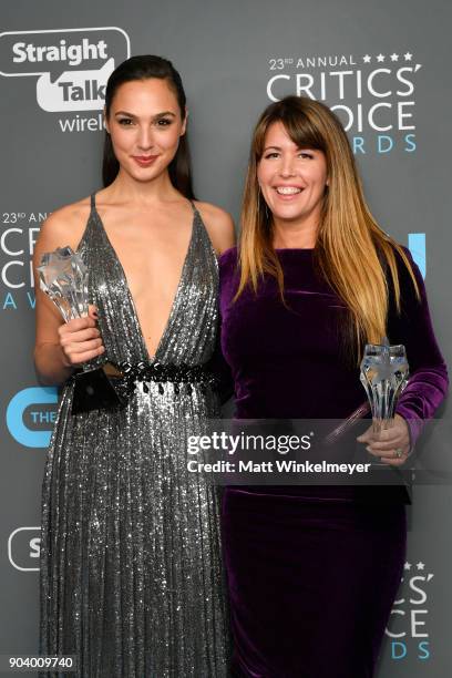 Actor Gal Gadot and director Patty Jenkins pose with the See Her Award and Best Action Movie award for 'Wonder Woman' during The 23rd Annual Critics'...