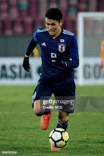 Kyosuke Tagawa of Japan drives the ball during the AFC U-23 Championship Group B match between Japan and Palestine at Jiangyin Sports Center on...