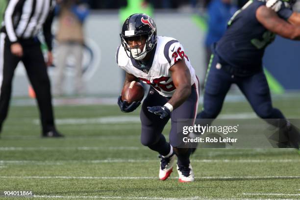 Lamar Miller of the Houston Texans runs with the ball during the game against the Seattle Seahawks at CenturyLink Field on October 29, 2017 in...