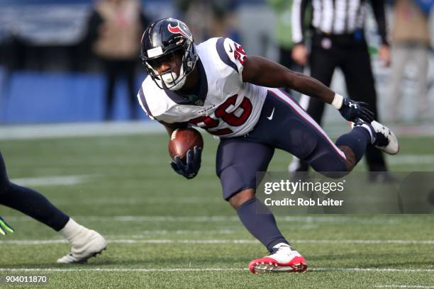 Lamar Miller of the Houston Texans runs with the ball during the game against the Seattle Seahawks at CenturyLink Field on October 29, 2017 in...